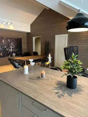 a kitchen with a counter with candles and a table at Gorgeous apartment in Geilo in Hol