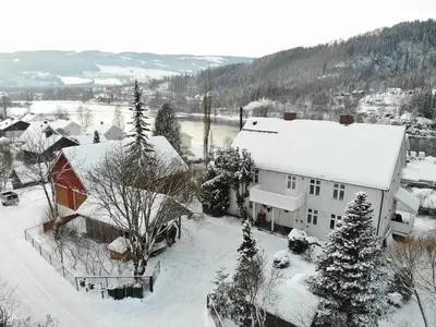 an aerial view of a house covered in snow at Large Family Friendly Apartment in Lillehammer