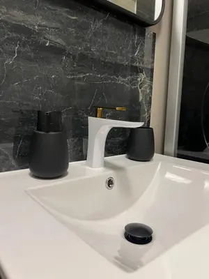 a bathroom sink with a faucet on a counter at Eidfjord Fjell in Eidfjord