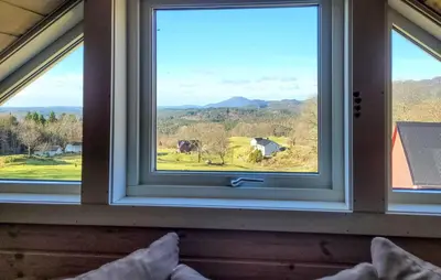 a window with a view of a farm at 1 Bedroom Amazing Apartment In Stord in Stord