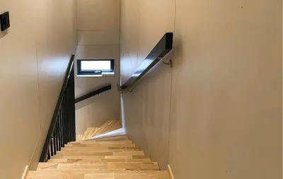 a staircase in a house with a window on the wall at 2 Bedroom Gorgeous Home In Bjorli in Bjorli