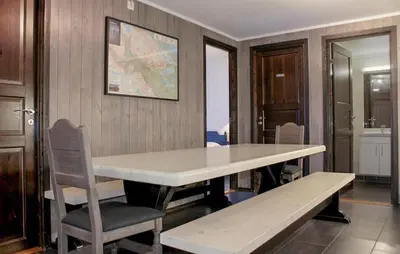a table and a bench in a room at Lovely Apartment In Hemsedal With Sauna in Hemsedal