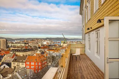 a balcony with a view of a city at Stay Panorama - Best view in Bergen l 2BR & Terrace in Bergen