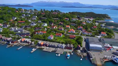 an aerial view of a small town on the water at Short way to city centre and Aker Solutions! in Stord