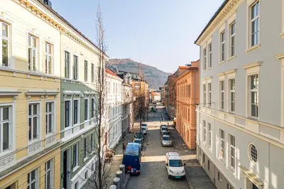 an overhead view of a city street with parked cars at Rosenberg Apartments in Bergen