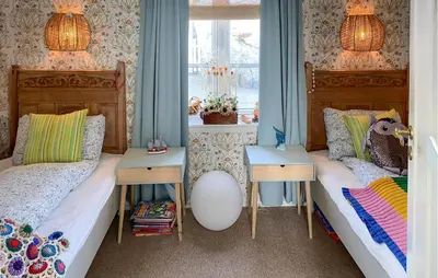 two beds in a room with two lamps and two tables at Amazing Home In Averøy With Wifi in Averoy