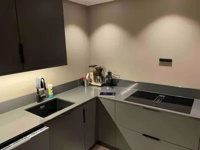 a kitchen with a sink and a counter top at Lars sitt hus in Lillehammer