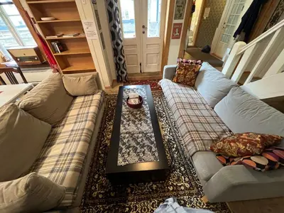 a living room with a couch and a coffee table at Knirkenheimen in Trondheim