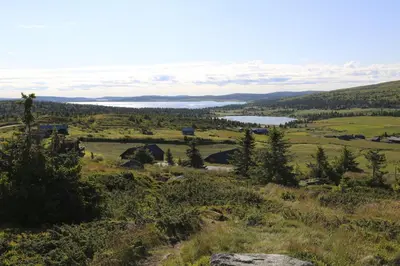 a view from the top of a hill with a lake at Pellestova Apartments in Hafjell