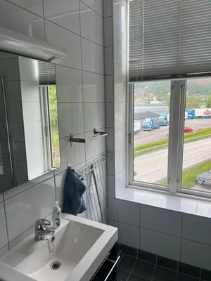 a bathroom with a sink and a window at Apartment in Stryn in Stryn