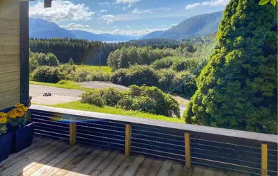a balcony with a view of the mountains at 1 Bedroom Gorgeous Apartment In Kvisvik in Kvisvik