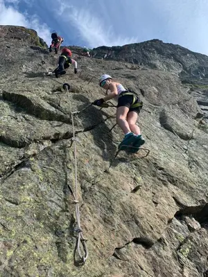 a group of people climbing on a rocky mountain at Handicap-friendly apartment with 3 bedrooms in Beitostøl
