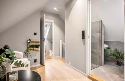 a living room with a glass door leading to a staircase at Townhouse - 700 meters from Bryggen in Bergen
