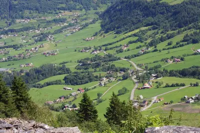 a view of a valley with green hills and trees at Sognefjorden-Vik i Sogn in Brekka