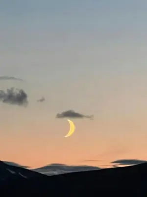a crescent moon in the sky at sunset at Traditional Mountain Cabin Near Hallingskarvet in Torpo