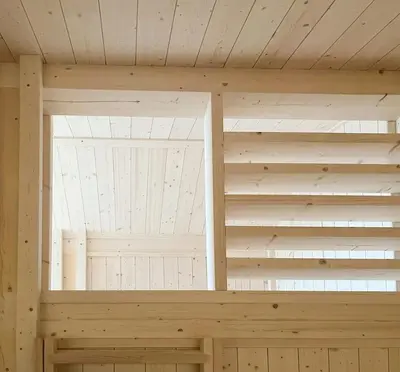 a sauna with a window in a wooden cabin at Architectural Gem With Views Of Hallingskarvet in Ål