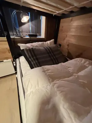 a bed in a room with a window at Apartment in Myrkdalen Voss in Vossevangen