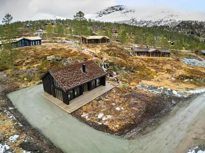 an aerial view of a house on a hill at Hydla Mountain Lodge in Stryn