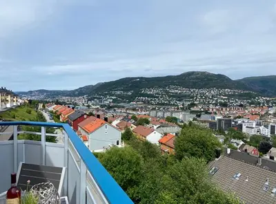 a view of a city from the balcony of a house at 2 Bedroom Apartment with free parking lot in Bergen