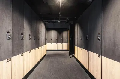 a row of lockers in a locker room at Modern and practical ski in & out apartment in Kyrkjebøen