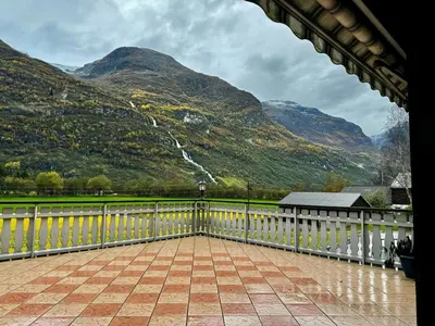 a balcony with a view of a mountain at 4 bedroom house in beautiful Oldedalen in Stryn