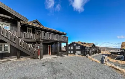 an empty driveway in front of a house at Stunning Apartment In Røn With Sauna in Ron