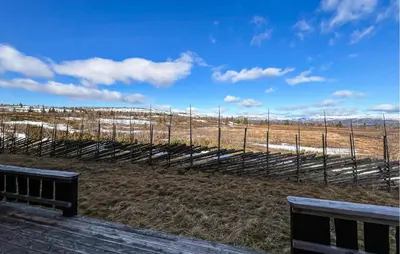 a view of a field with a fence at Stunning Apartment In Røn With Sauna in Ron