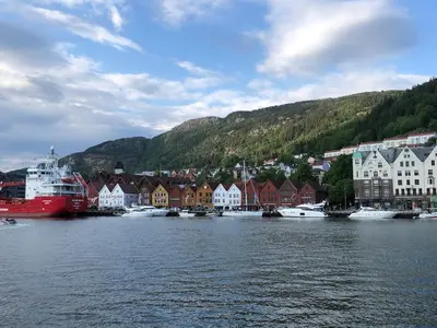 a town with a harbor with boats in the water at Seaside Cabin with panoramic view in Bømlo