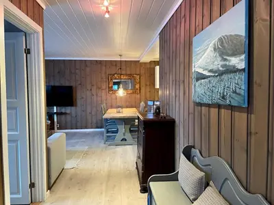 a room with a desk and a computer on a wall at 3 Bedroom Apartment with nice view by Gaustatoppen in Gaustablikk