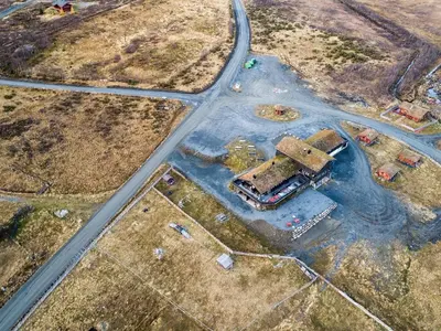 an aerial view of a building on the side of a road at Syndinstøga in Ryfoss