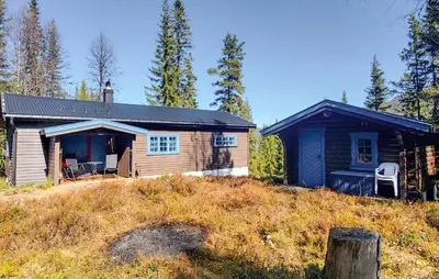 a small house on top of a hill at 4 Bedroom Amazing Home In Rødberg in Rødberg