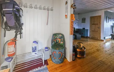 a room with a room with a snowboard on the wall at 4 Bedroom Amazing Home In Rødberg in Rødberg