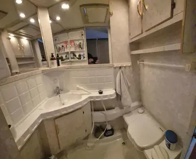 a bathroom with a sink and a toilet at Trysil Caravan Cycle in-out in Trysil