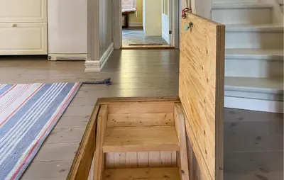 a wooden box on the floor of a room with stairs at Stunning Home In Runde With Wifi in Runde
