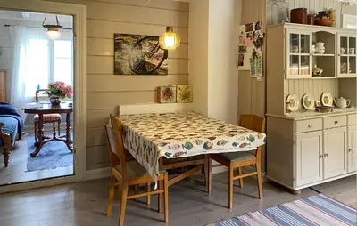 a kitchen with a table and chairs and a dining room at Stunning Home In Runde With Wifi in Runde