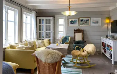 a living room with a couch and chairs and a table at Stunning Home In Runde With Wifi in Runde
