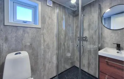 a bathroom with a shower and a sink at Awesome Home In Sletta With Wifi in Sletta