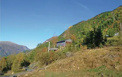 a house on the side of a hill at Stunning Home In Steinstø With Wifi in Steinstø
