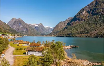 a view of a lake with mountains in the background at Awesome Home In Fjærland in Fjarland