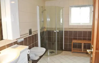 a bathroom with a shower and a toilet and a sink at Amazing Home In Hemsedal With Sauna in Hemsedal