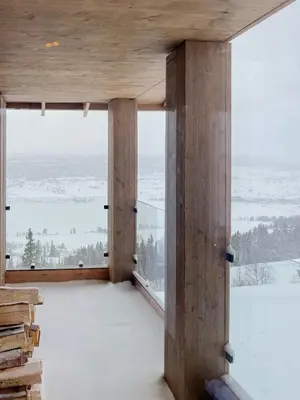 a room with a large window with a view at Family Cabin With Picturesque View At Røn in Ron