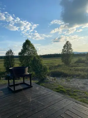 a bath tub sitting on a table on a wooden deck at Golsfjellet in Gol