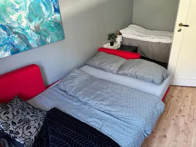 a small room with a bed and a bed sqor at FjordNest Årdalstangen in Årdalstangen