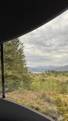a view of a field from a window at Birdbox Bergen in Bergen