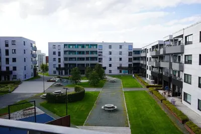 an aerial view of an apartment complex with buildings at Staymate apartment at Lade in Trondheim