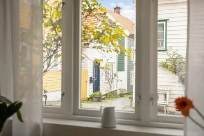 a window with a view of a street outside at Welcome to our home in the centre of Bergen! in Bergen