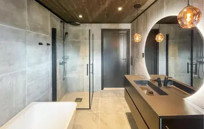 a bathroom with a shower and a sink and a toilet at Amazing Home In Løten in Løten