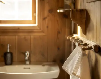 a bathroom with a sink and a window at Per Amundsagården in Røros