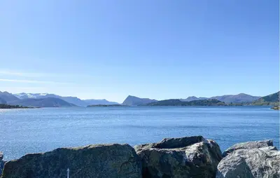a view of a large body of water with rocks at Awesome Home In Ørsta in Ørsta