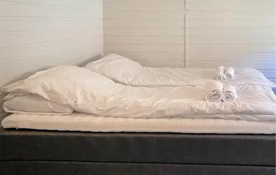two white beds with towels on top of them at 2 Bedroom Gorgeous Home In Ørsta in Ørsta